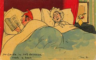 Mr Caudle in self-defence reads a book
